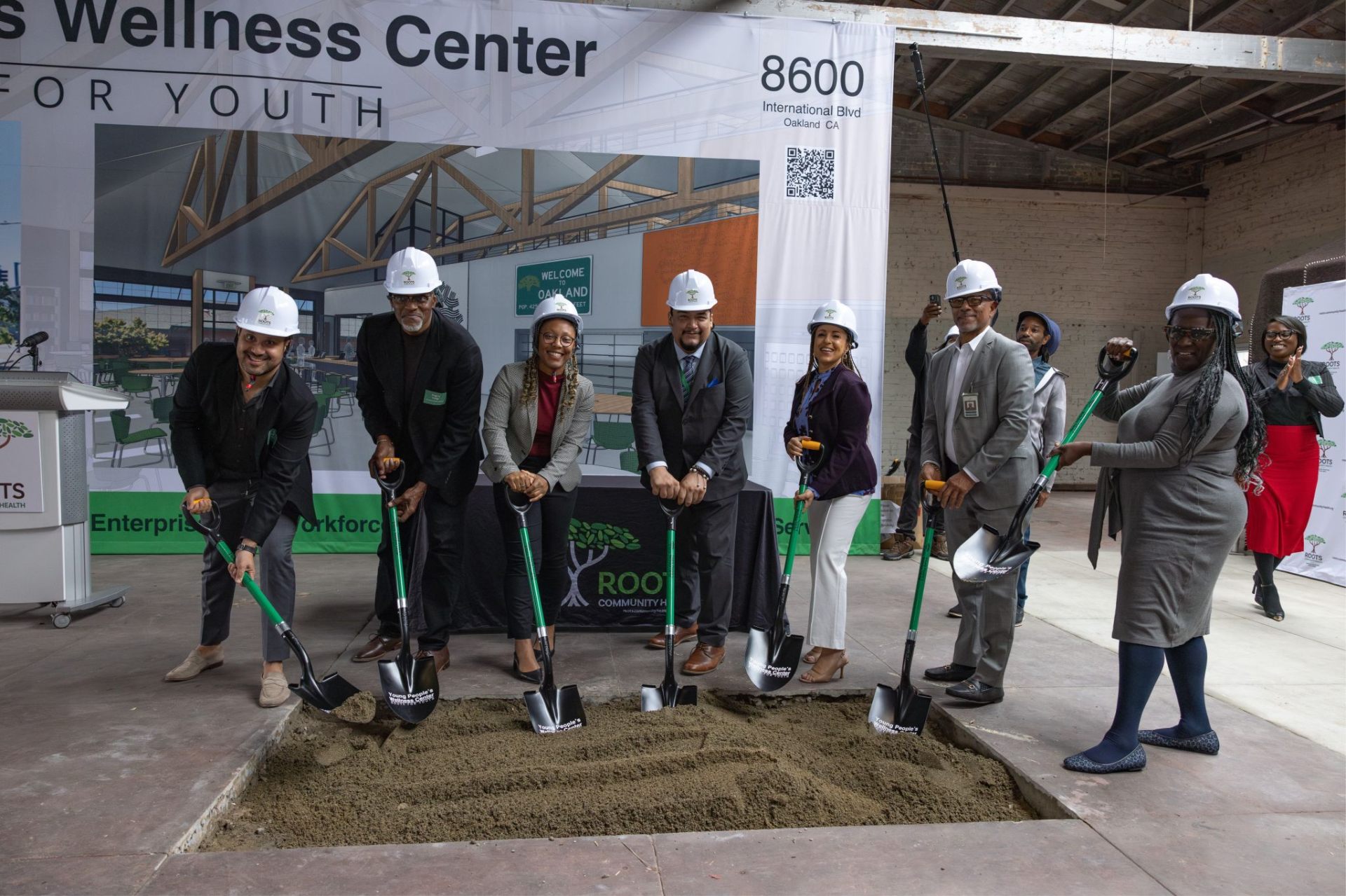 Roots Community Health leaders, partners, and supporters breaking ground on the Young People's Wellness Center in East Oakland